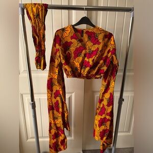S/M African print crop top with dramatic elongated sleeves.